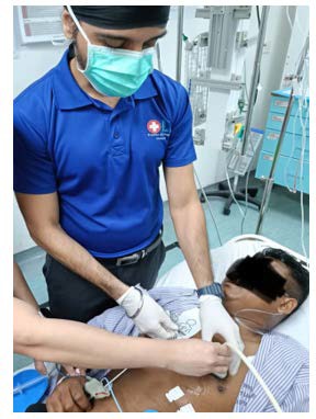 A person wearing a mask and gloves holding a person's face

AI-generated content may be incorrect.
