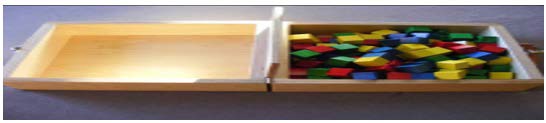 A shelf with a box of colorful blocks

AI-generated content may be incorrect.